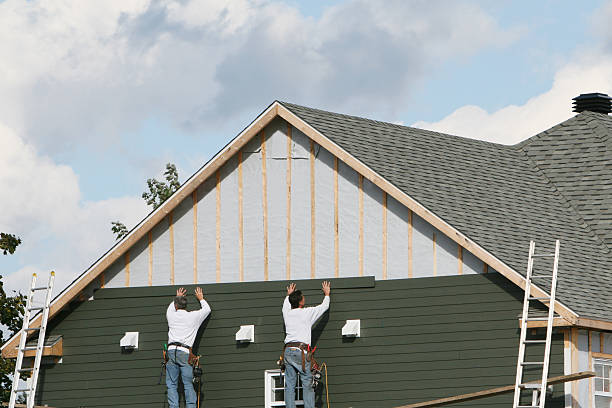 Professional Storm Damage Siding Repair technician working in Nanty Glo, PA